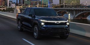 The 2025 Chevrolet Silverado EV on a evening drive through downtown.