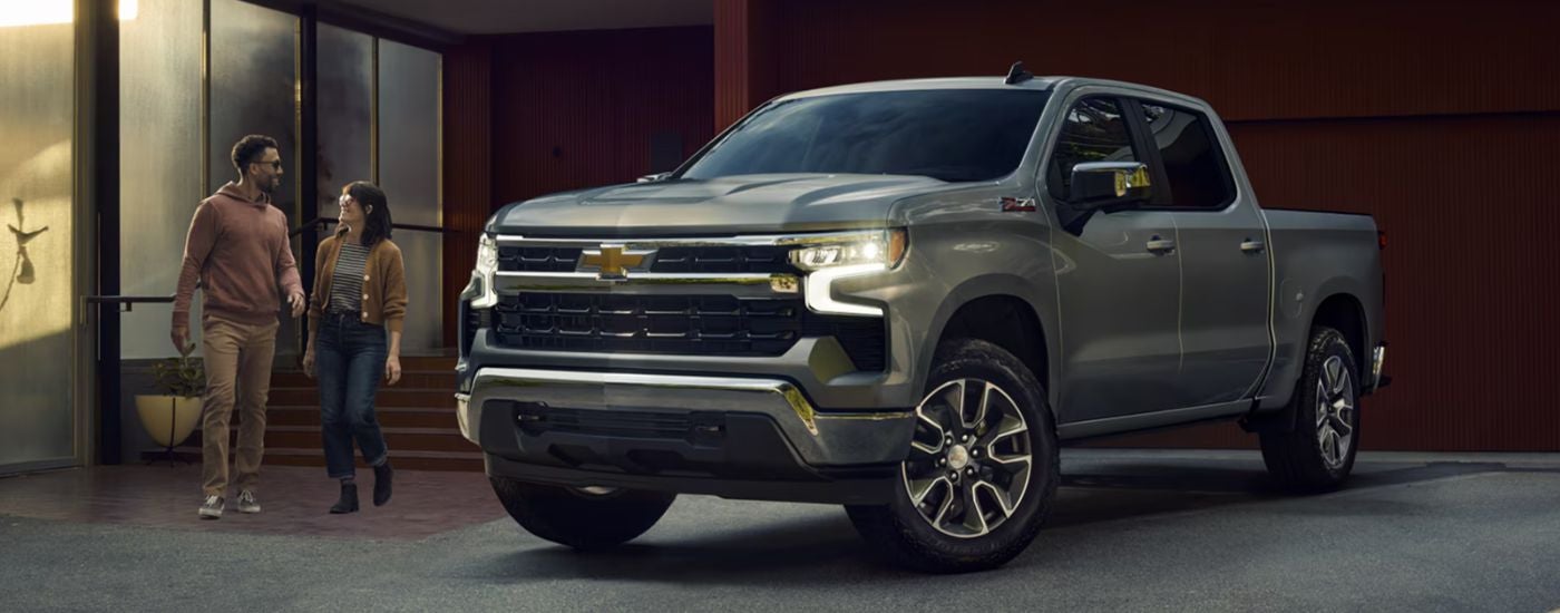 A gray 2026 Chevy Silverado 1500 LT shown parked in a driveway.