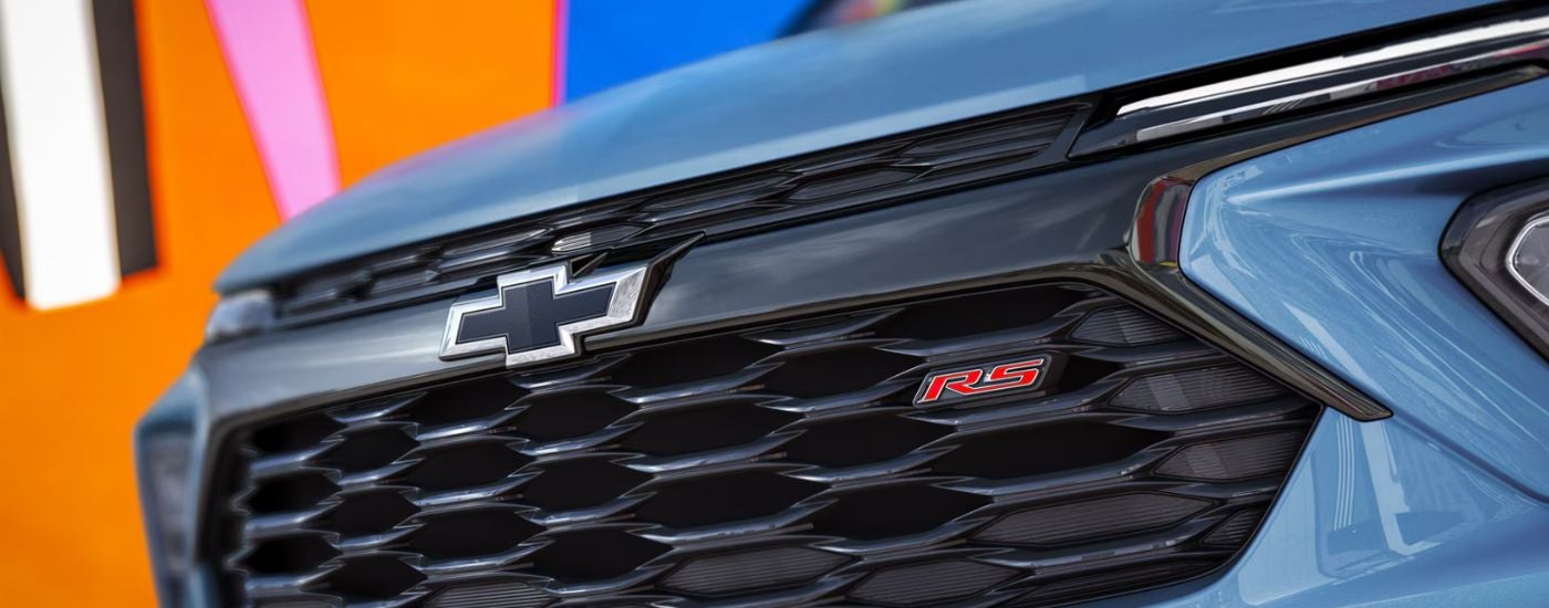 Front grille of a blue 2026 Chevy Trailblazer RS.