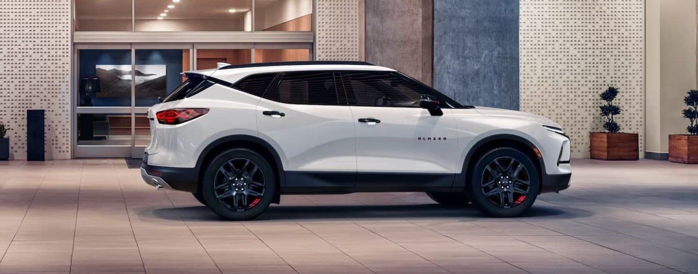 White 2023 Chevy Blazer Redline parked in front of a building